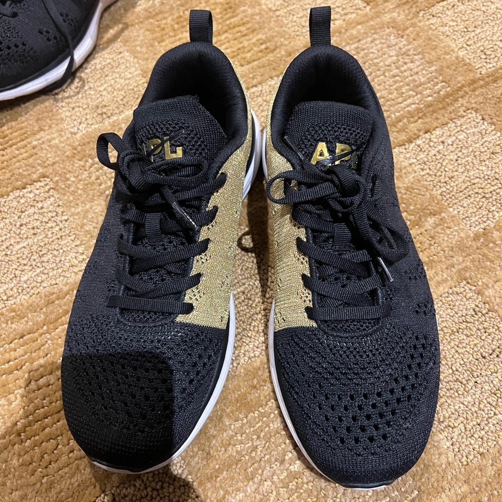 APL Black and Gold Athletic Shoes